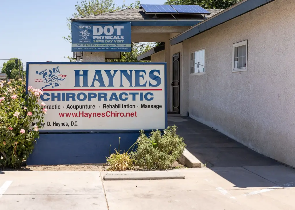 The Haynes Chiropractic building on Stockdale Highway, with the DOT Physicals sign out front