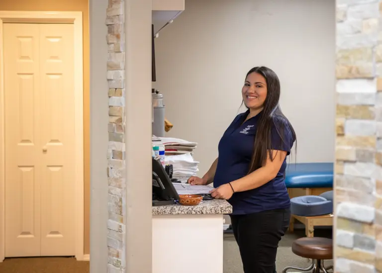 A team member at the therapy station