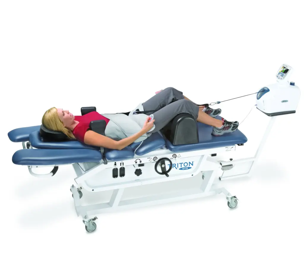 A patient lying face-up on the Triton DTS decompression table